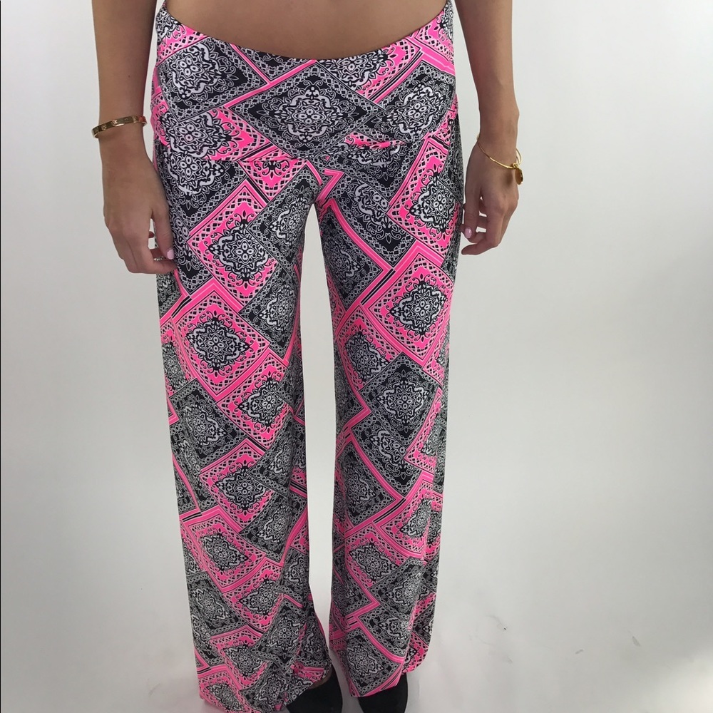 One size fits most black and pink beach pants.